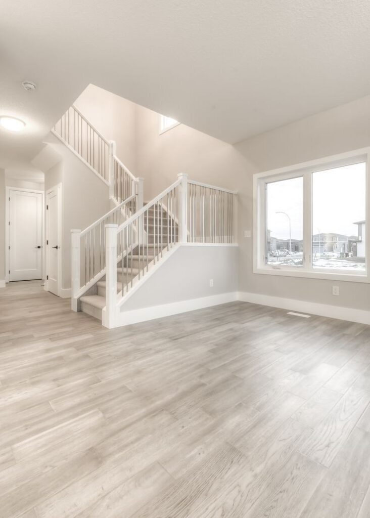 White painted walls along a staircase in a new build