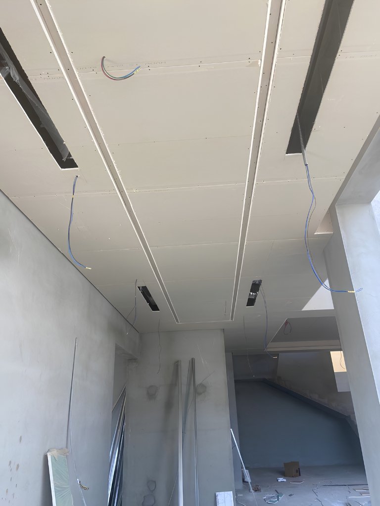 Drywall installation in Peterborough County — ceiling with recessed light channels