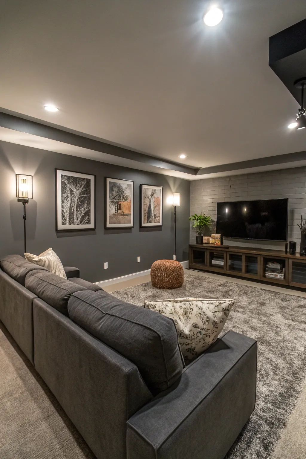 Finished luxury basement lounge with pool table, stone fireplace and reclaimed wood wall