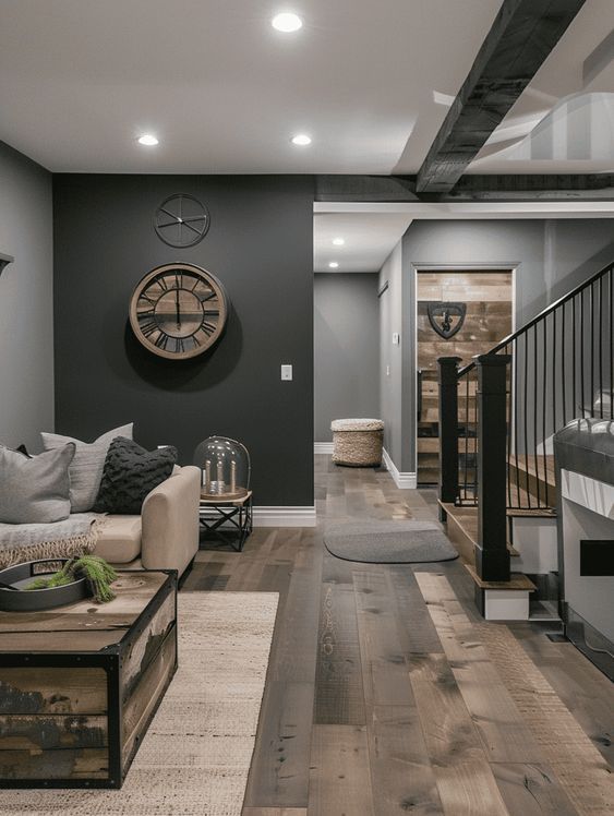 Finished luxury basement lounge with pool table, stone fireplace and reclaimed wood wall