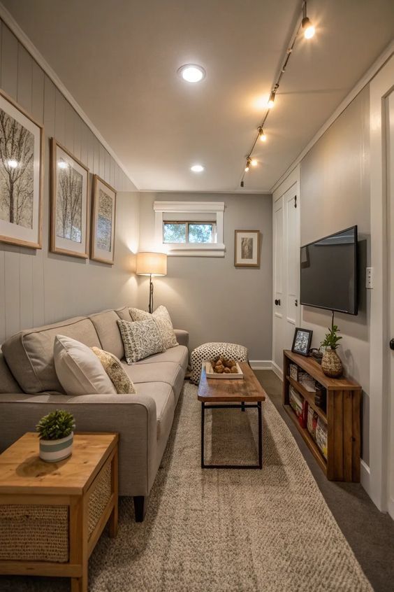 Finished luxury basement lounge with pool table, stone fireplace and reclaimed wood wall