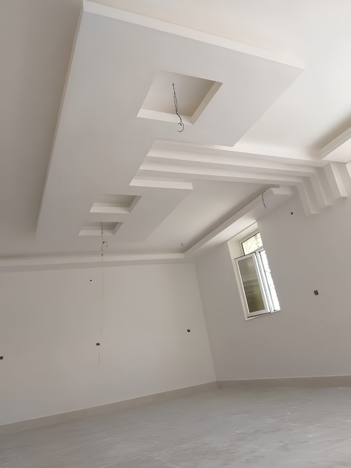 Drywall installation in Brampton — stepped gypsum ceiling design