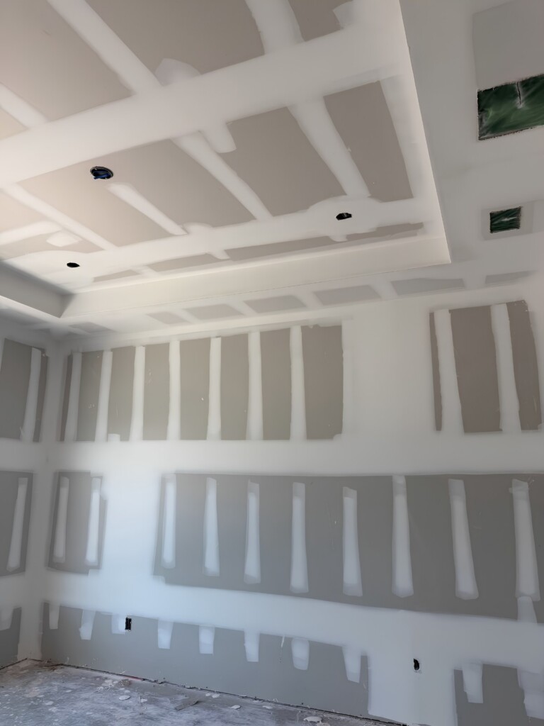 Taped drywall walls and tray ceiling before sanding