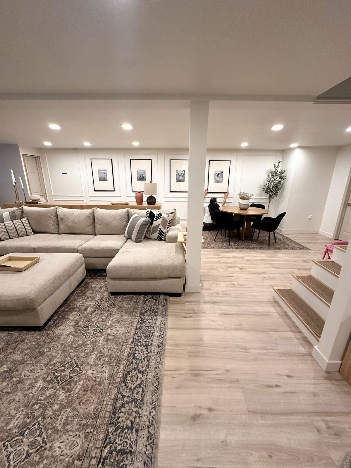 Open basement suite living room with dining nook
