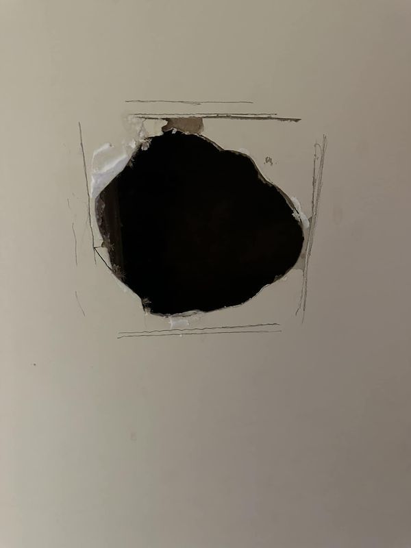 Drywall repair patch sanded and primed ready for paint in Oxford County