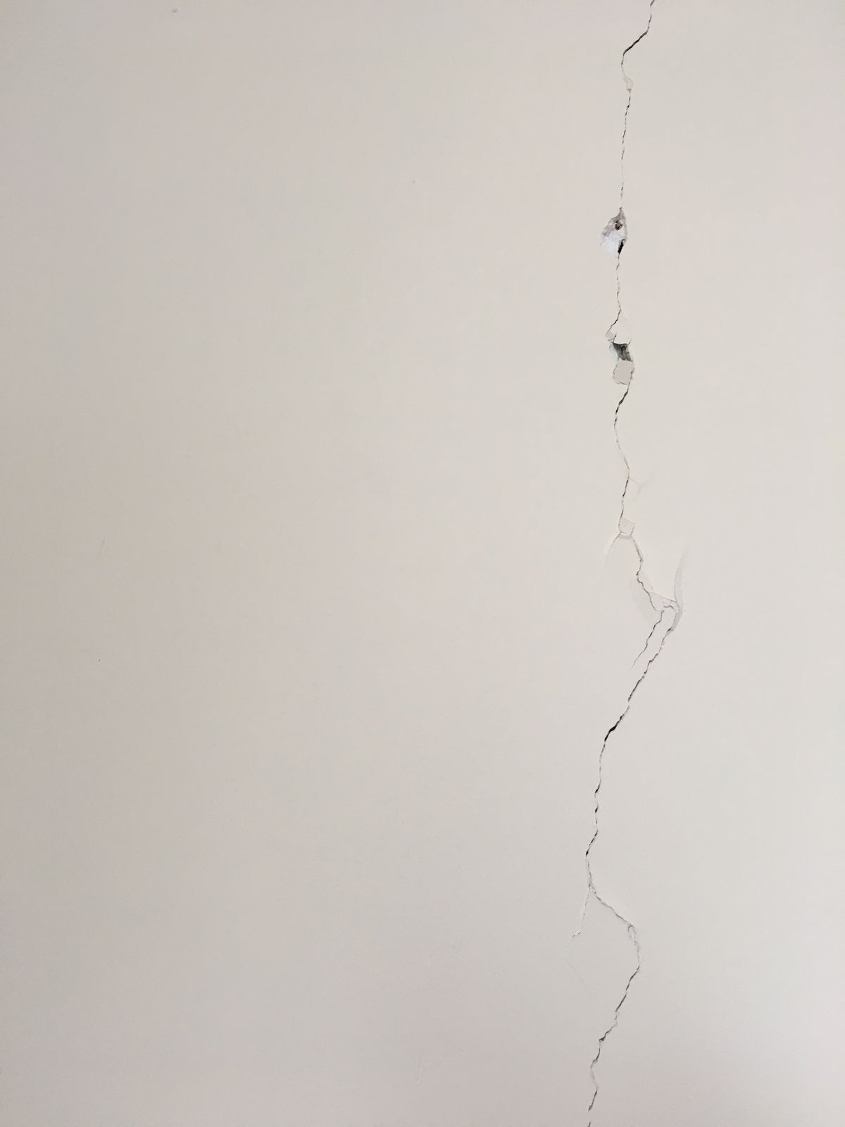 Long settling crack running down a York Region wall