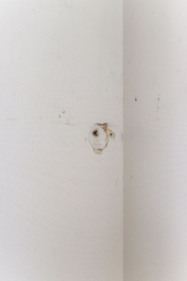 Clean drywall patch repair in Aurora, sanded and ready for paint by IntraBuild